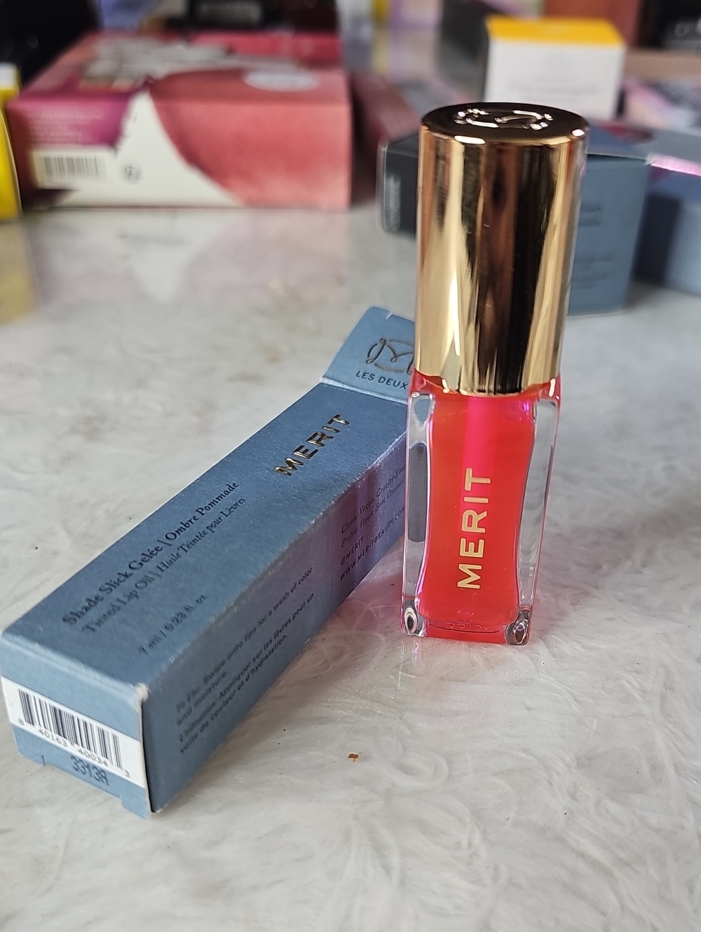 MERIT Liquid Lip Tint in Coral Pink